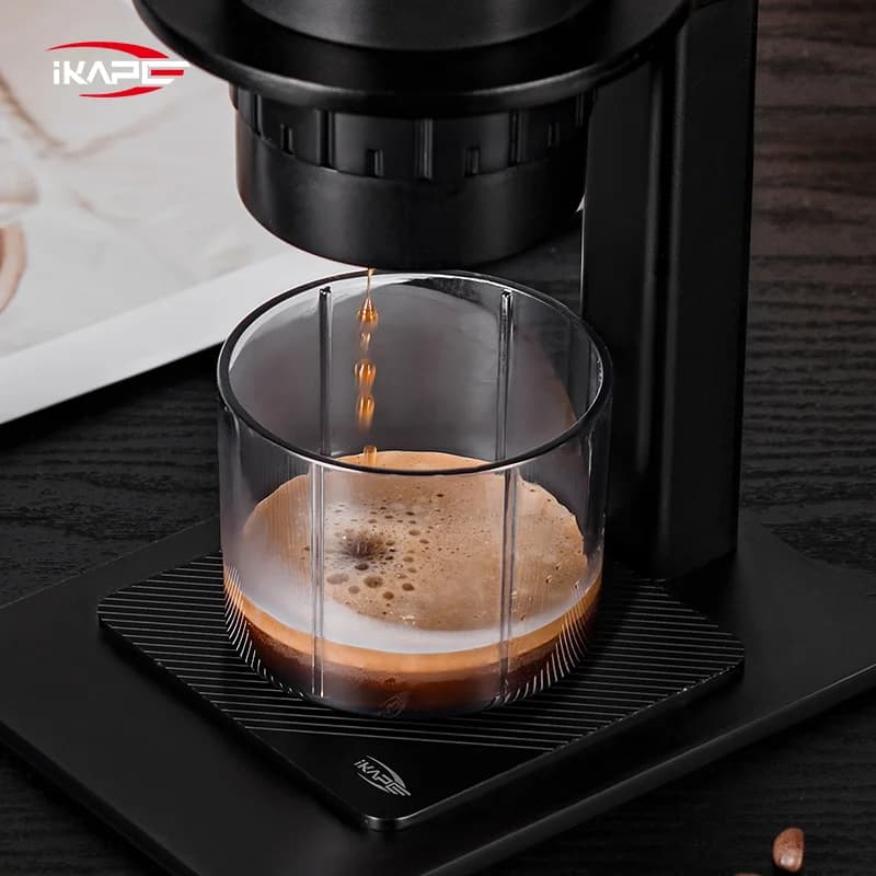 Macchina da caffè manuale portatile per capsule e caffè macinato